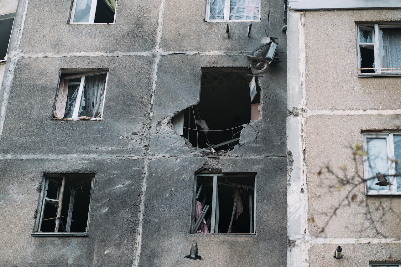 A view of a hole in the wall of a residential building as a result of shelling in Kherson on 24 November 2022