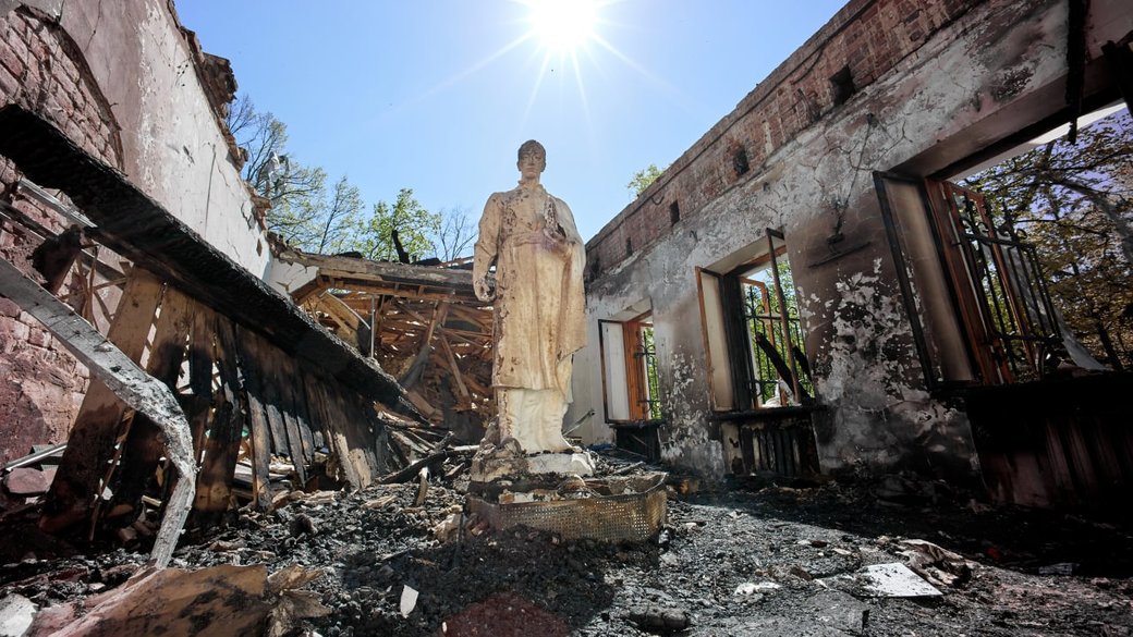 Statue of Hryhorii Skovoroda at the Skovoroda Museum in Kharkiv region after a Russian shell hit the building. Serhii Kozlov, May 2022.