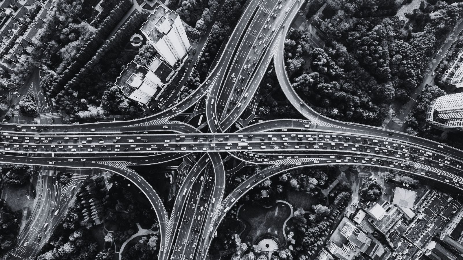 infrastructure - a road junction from above in black and white