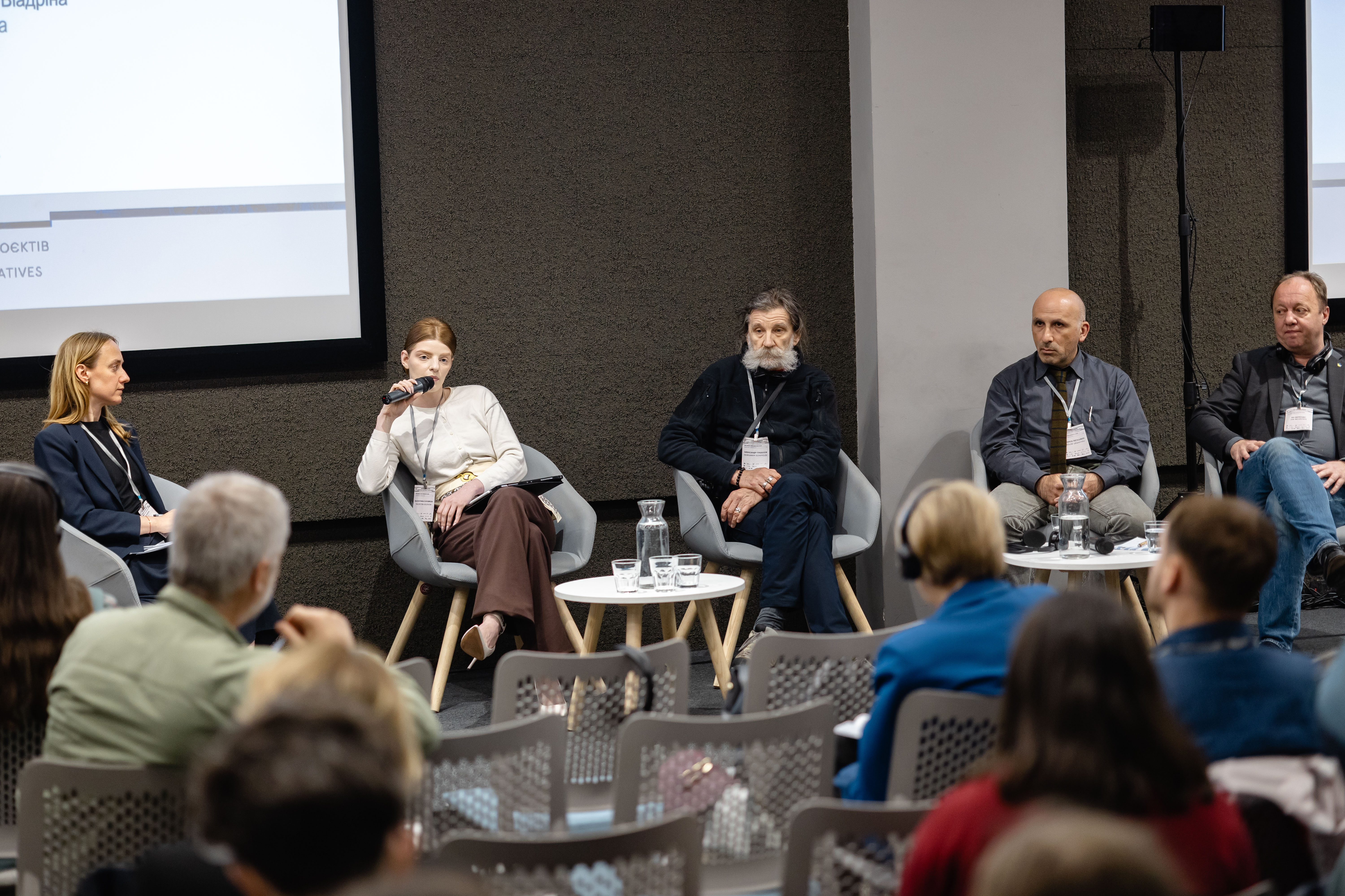 Participants of the “In Wartime and After: Enabling Solidarity through Documenting” panel at the Most Documented War symposium in Lviv, Ukraine