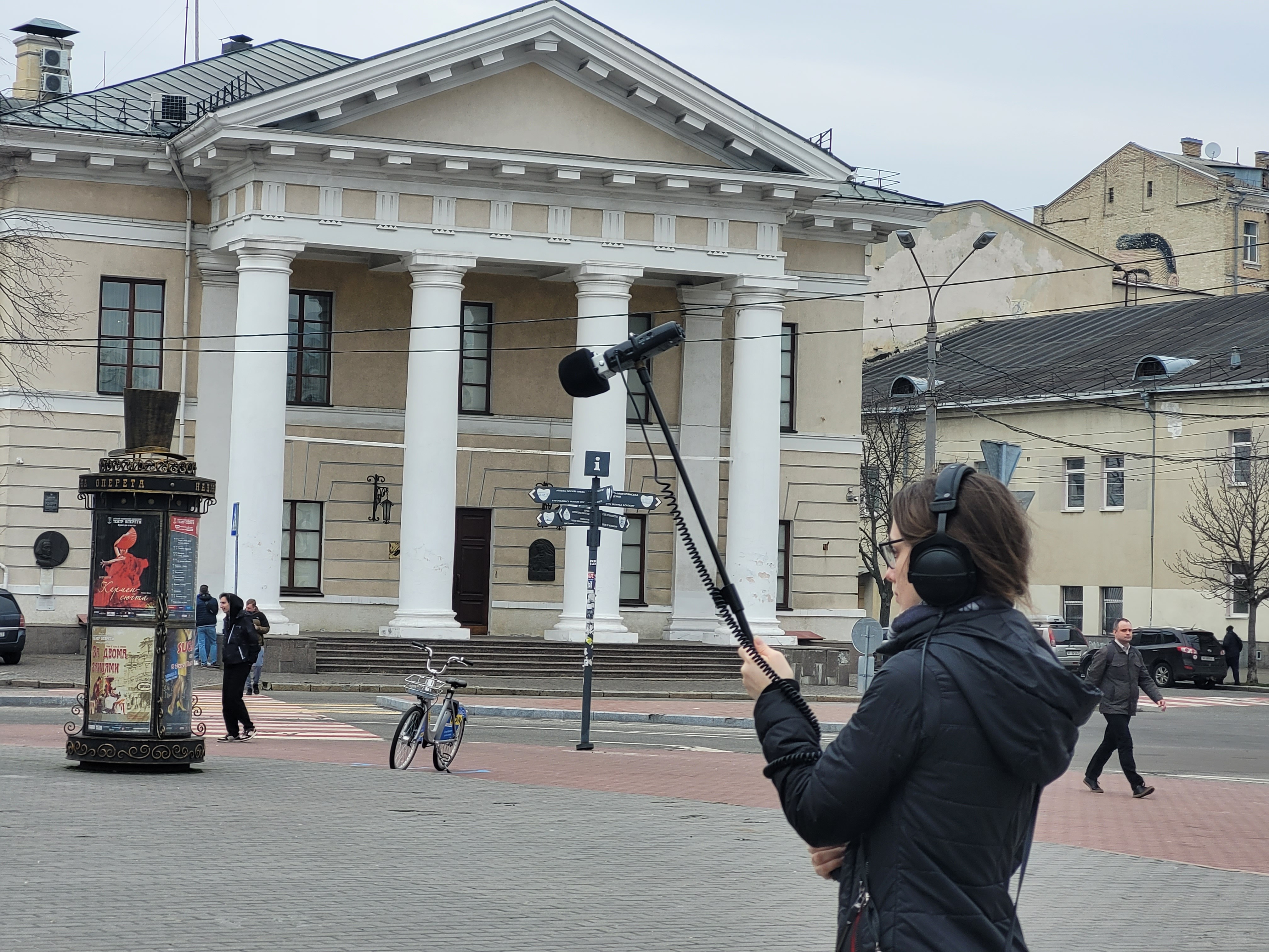 Sound engineer Olga Skrypnikova records the sounds of streets in Kyiv.