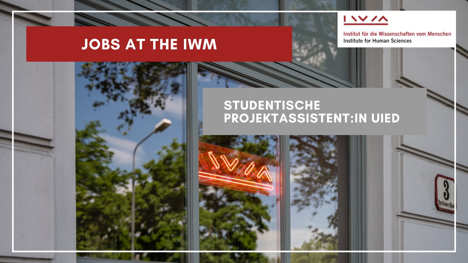 Red IWM sign and IWM building from the outside