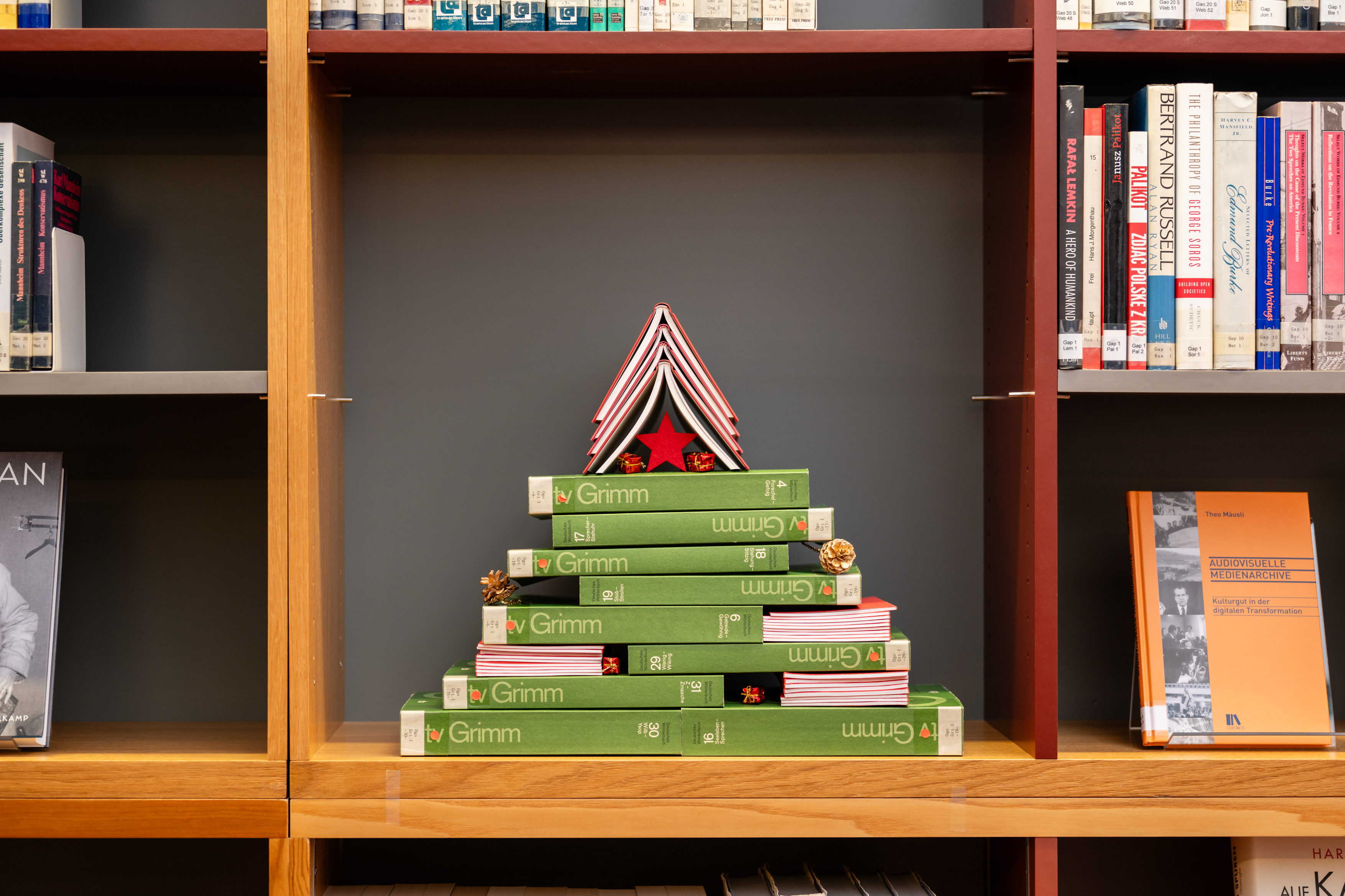 Christmas tree made out of books in the meeting room