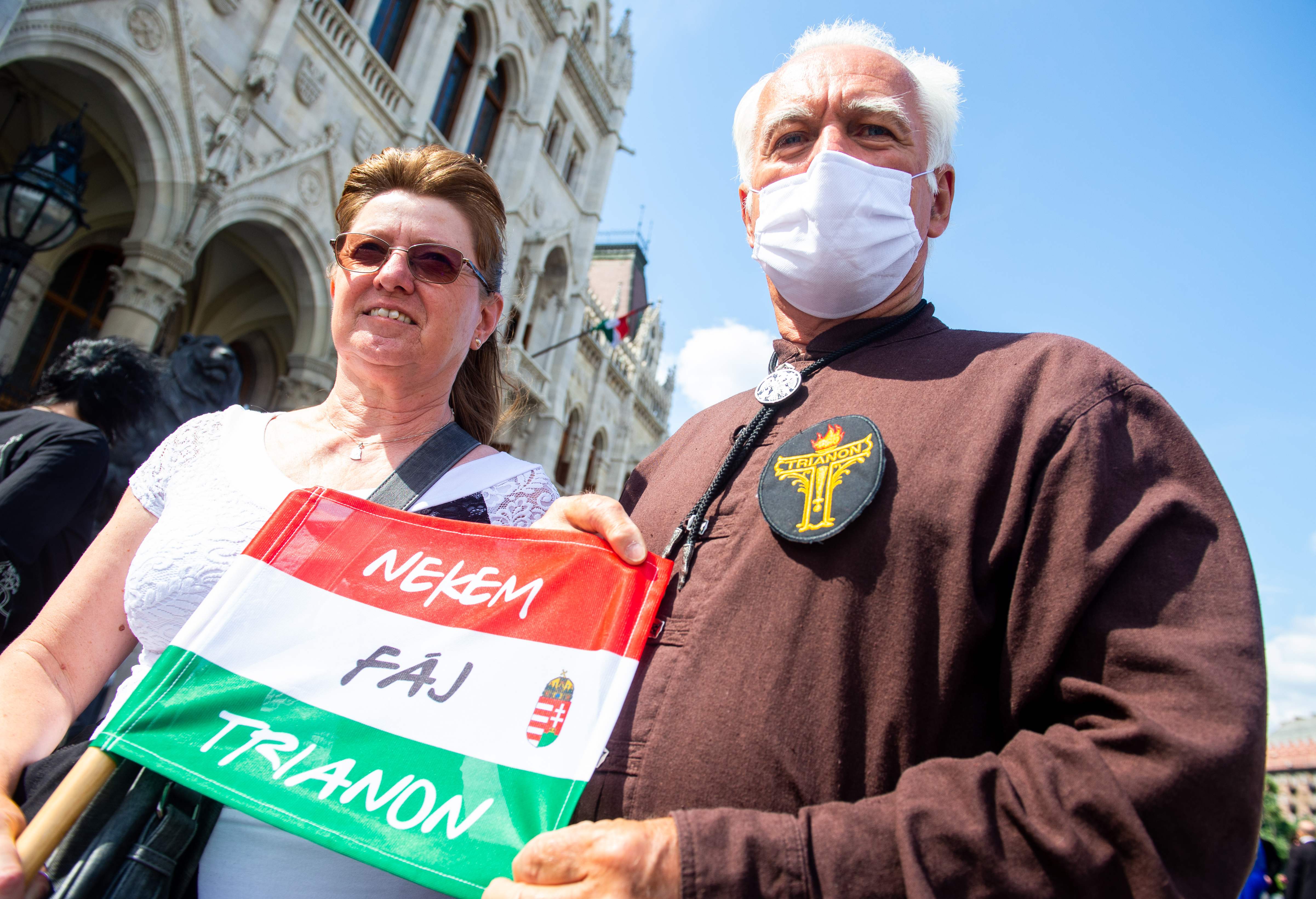 “I am hurt by Trianon.” Supporters of the World Federation of Hungarians take part in a memorial event in front of the Hungarian Parliament in Budapest on June 2, 2020, commemorating the 100th anniversary of the WWI peace agreement.