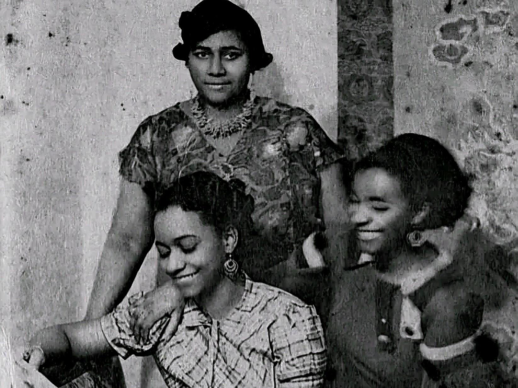 Paulette (standing), Lucie (on the left), and Jeanne Nardal at their apartment in Clamart, outside Paris, October 19, 1935