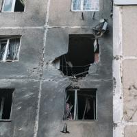 A view of a hole in the wall of a residential building as a result of shelling in Kherson on 24 November 2022