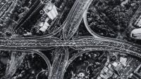 infrastructure - a road junction from above in black and white