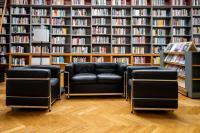 The IWM Library with a seating area near the periodicals section.